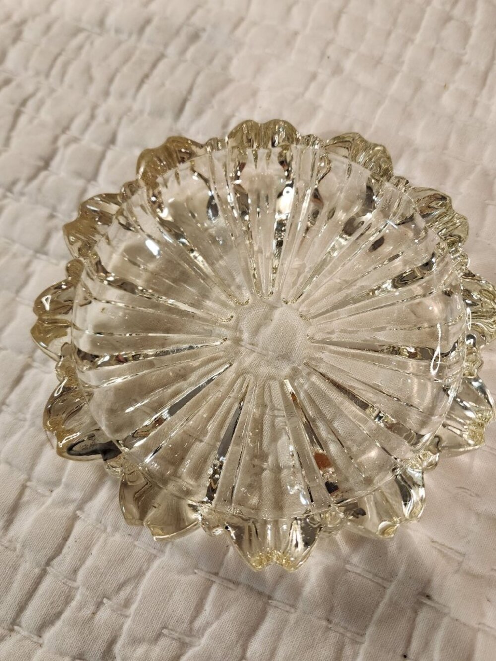 Hazel-Atlas clear glass ashtray likely from the 1940s